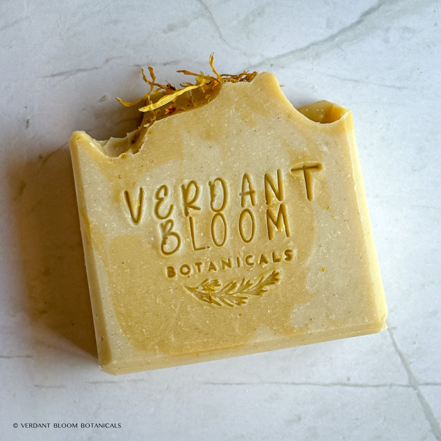 First Light soap stamped with logo