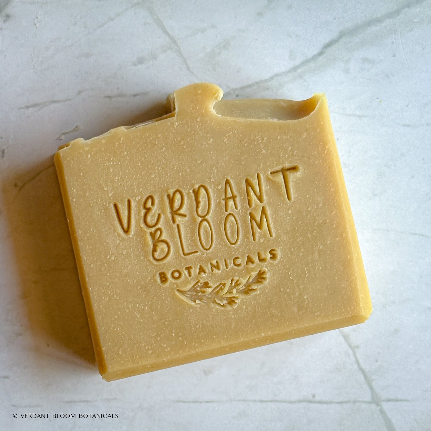 Milk and Honey soap stamped with logo