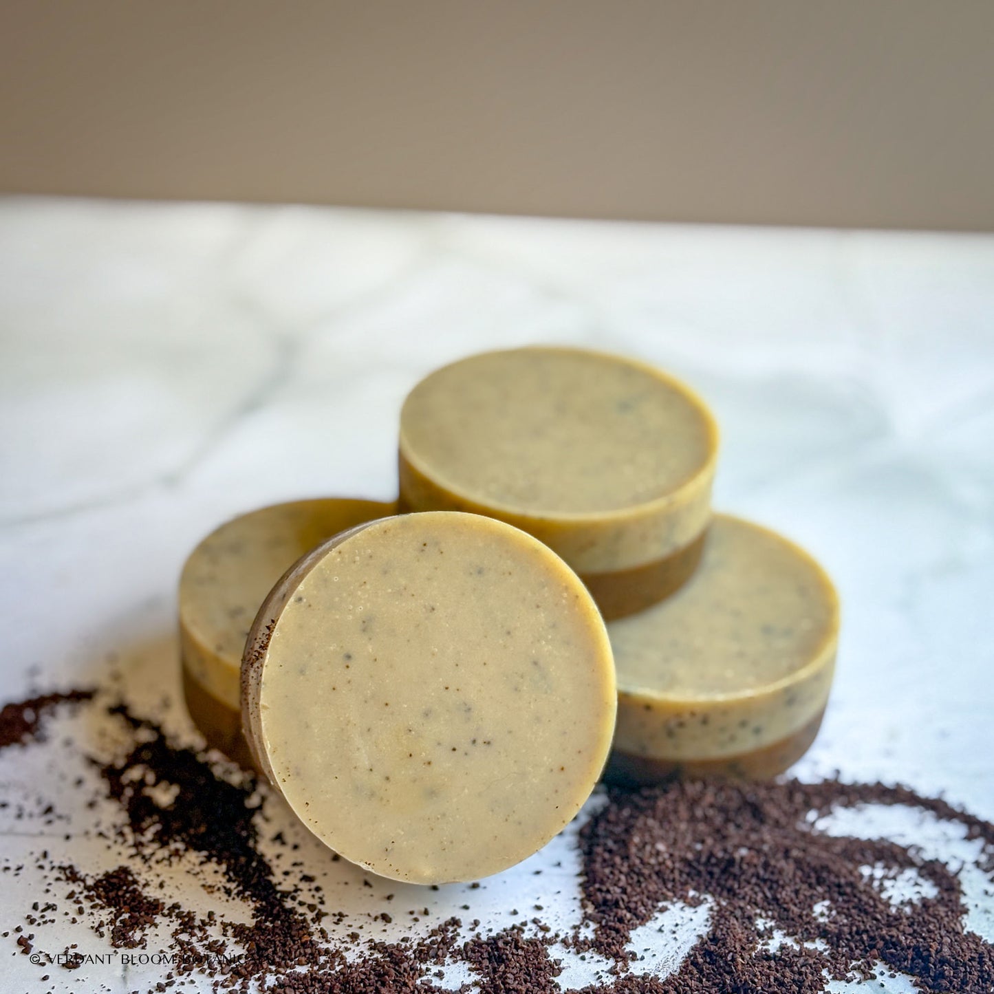 Handmade exfoliating mini soap with ground coffee