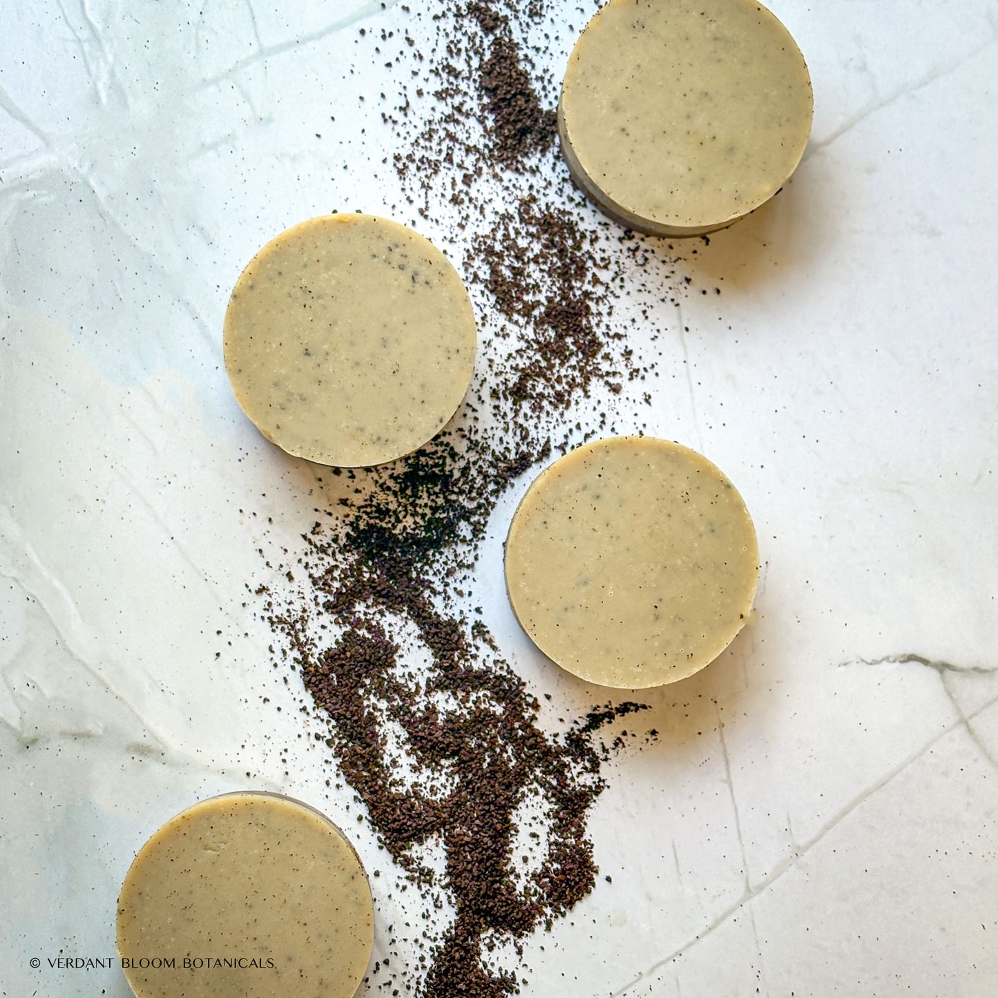 Handmade exfoliating mini soap with ground coffee
