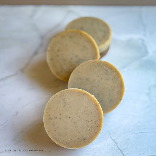 Handmade exfoliating mini soap with ground coffee