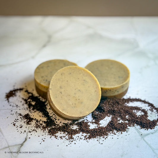 Handmade exfoliating mini soap with ground coffee