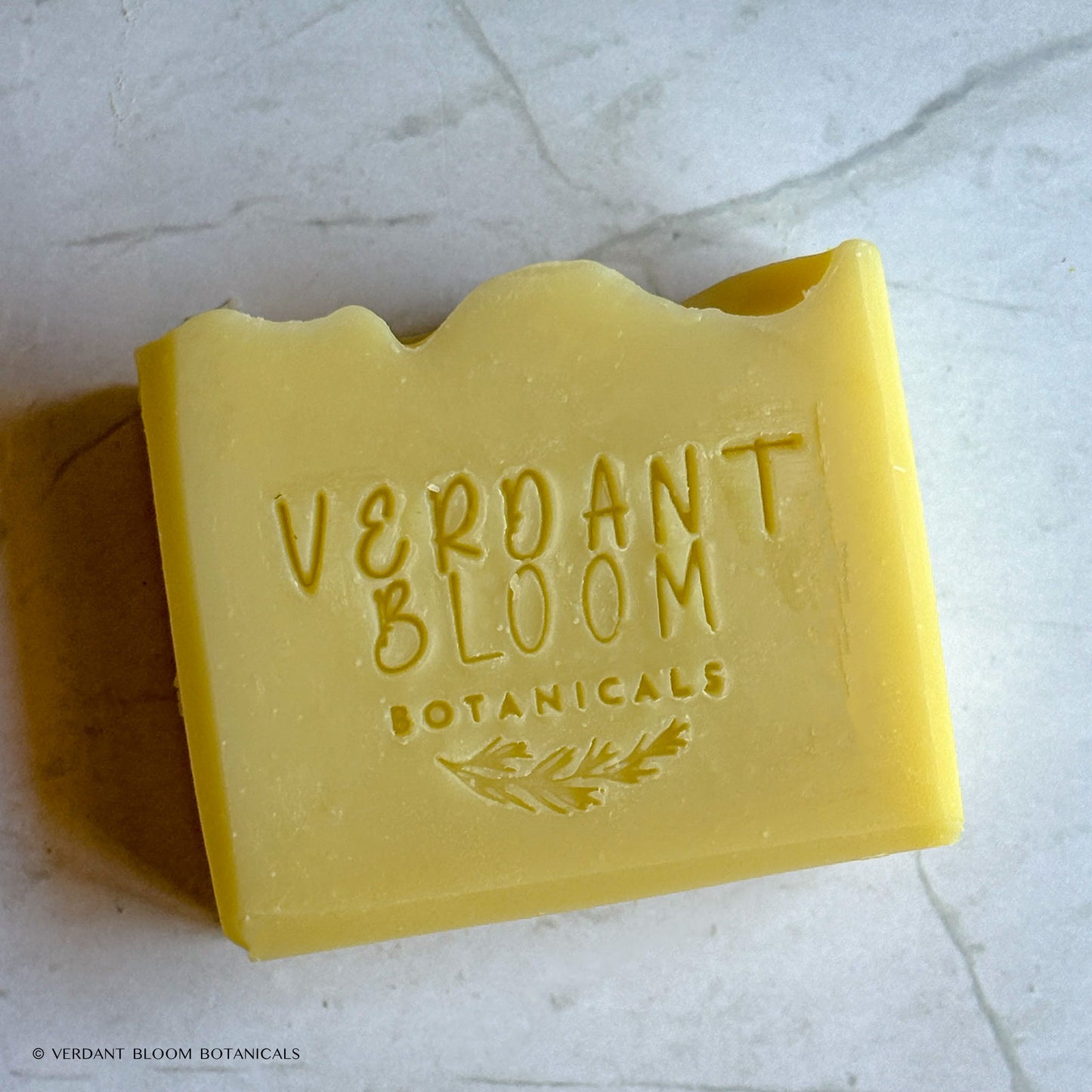 Raw Remedy soap stamped with logo