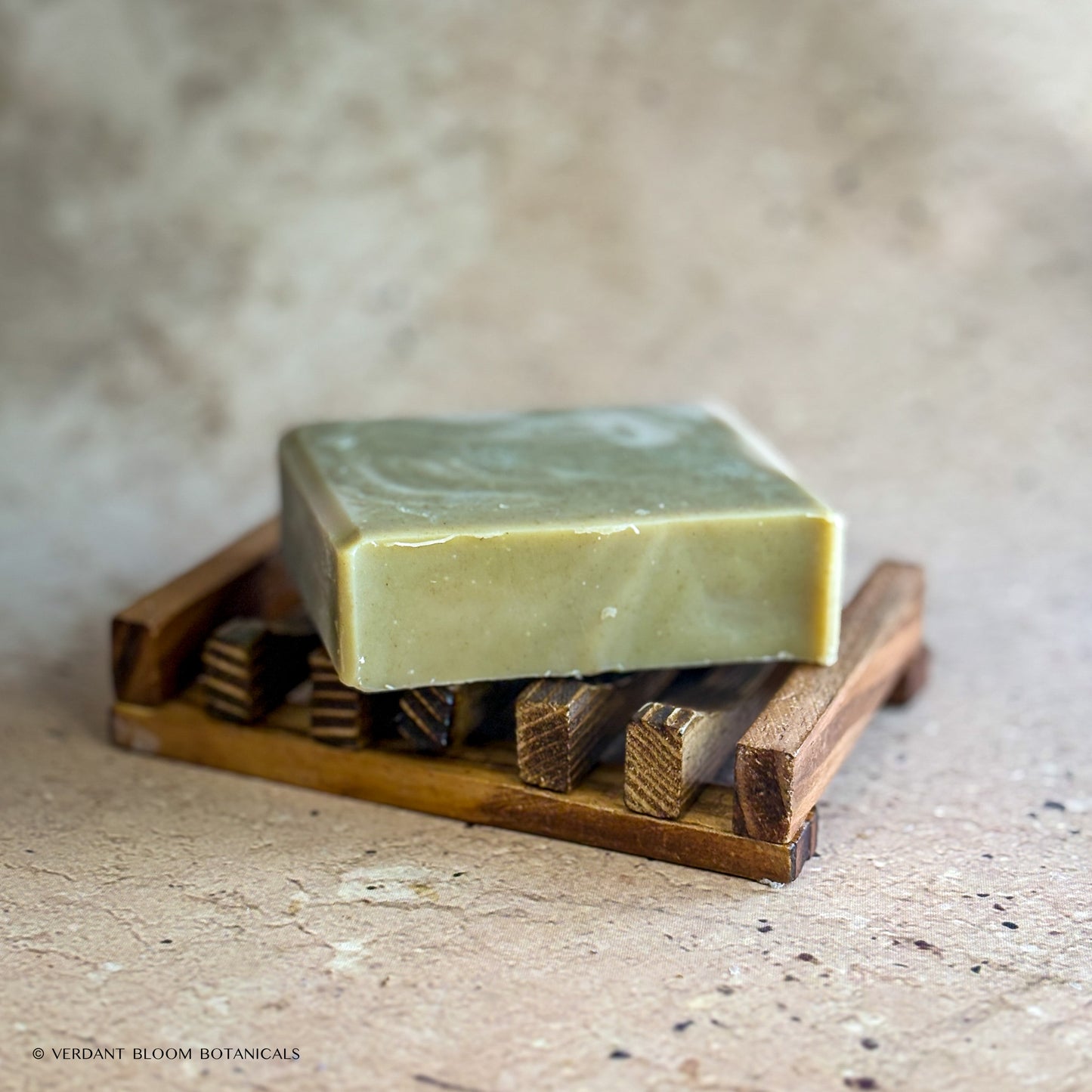Still Pines soap bar on wooden soap holder