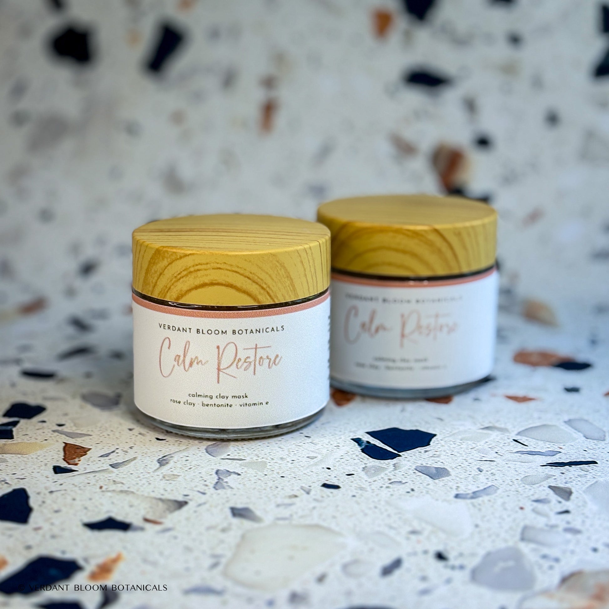Two jars of Calm Restore face mask
