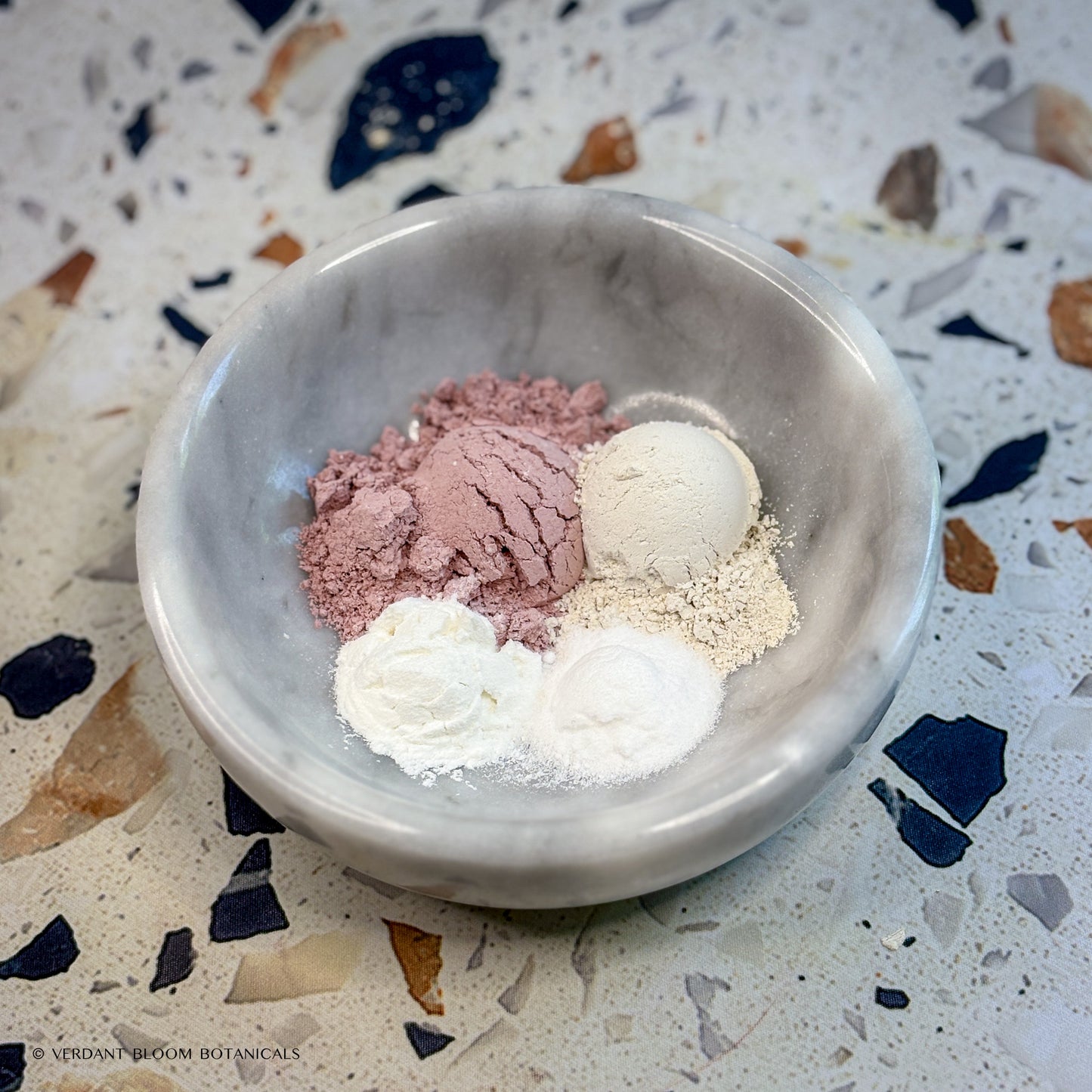 Bowl holding all ingredients in Calm Restore face mask