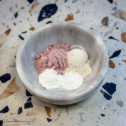 Bowl holding all ingredients in Calm Restore face mask