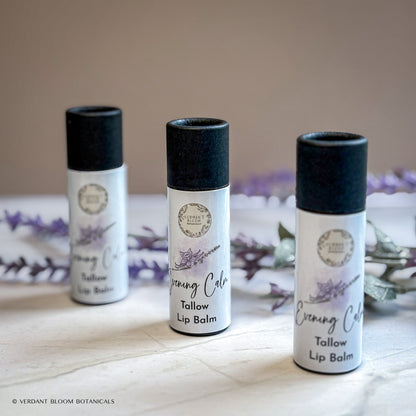 three tubes of Evening Calm lip balm standing next to each other