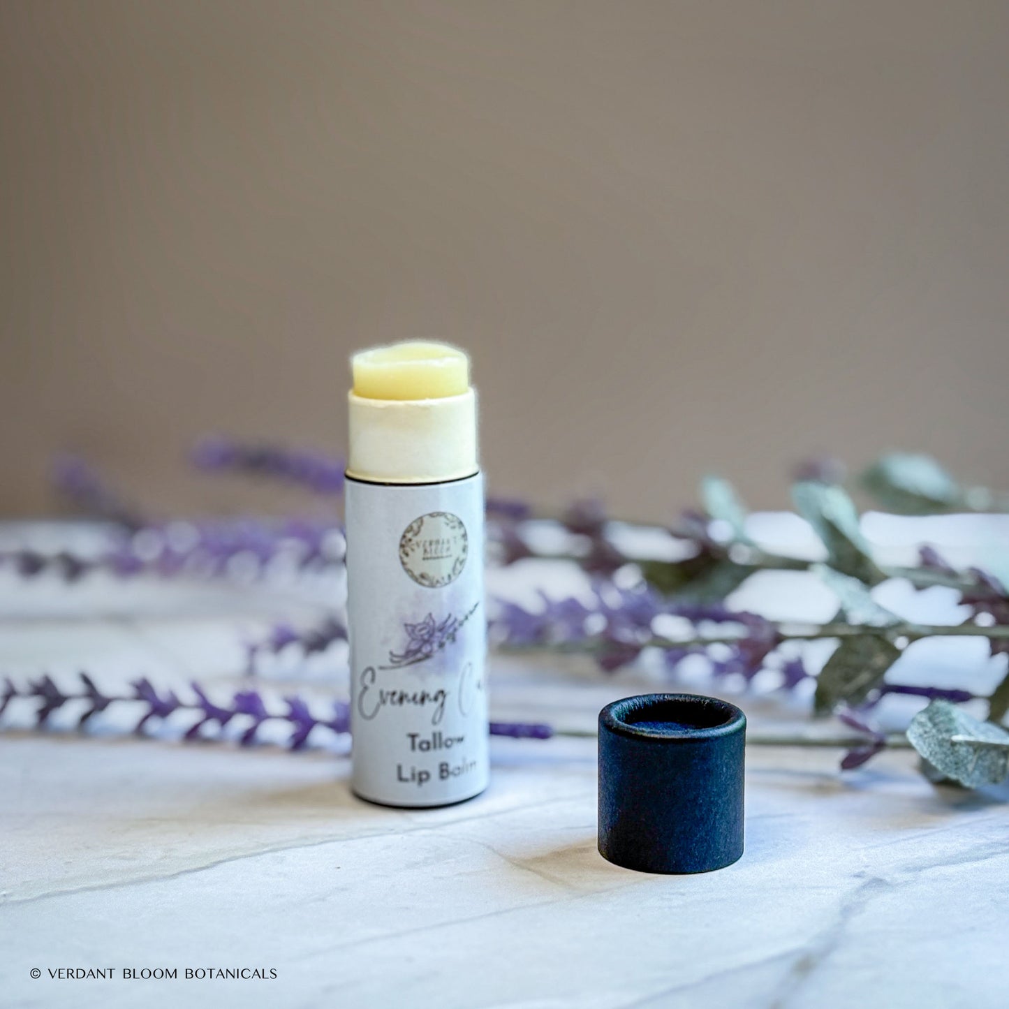 Uncapped tube of Evening Calm lip balm