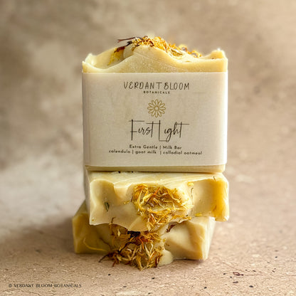 stack of First Light soap bars with label