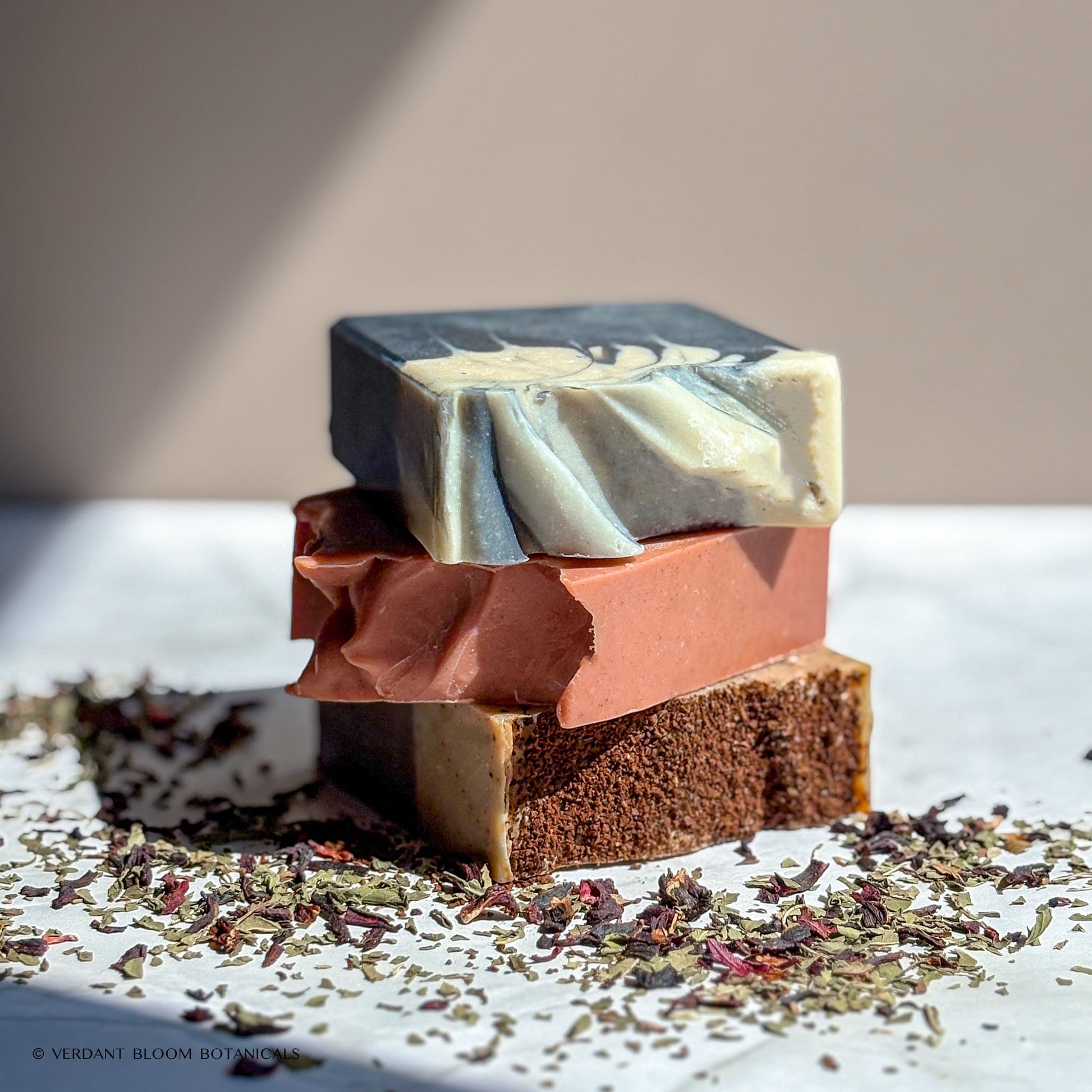 Detox soap bundle with activated charcoal, turmeric, and coffee grounds for exfoliating and detoxifying acne-prone skin