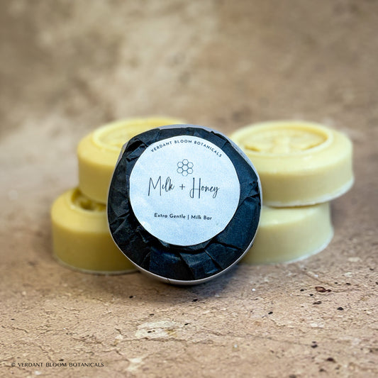 stack of Milk & Honey mini soaps with label