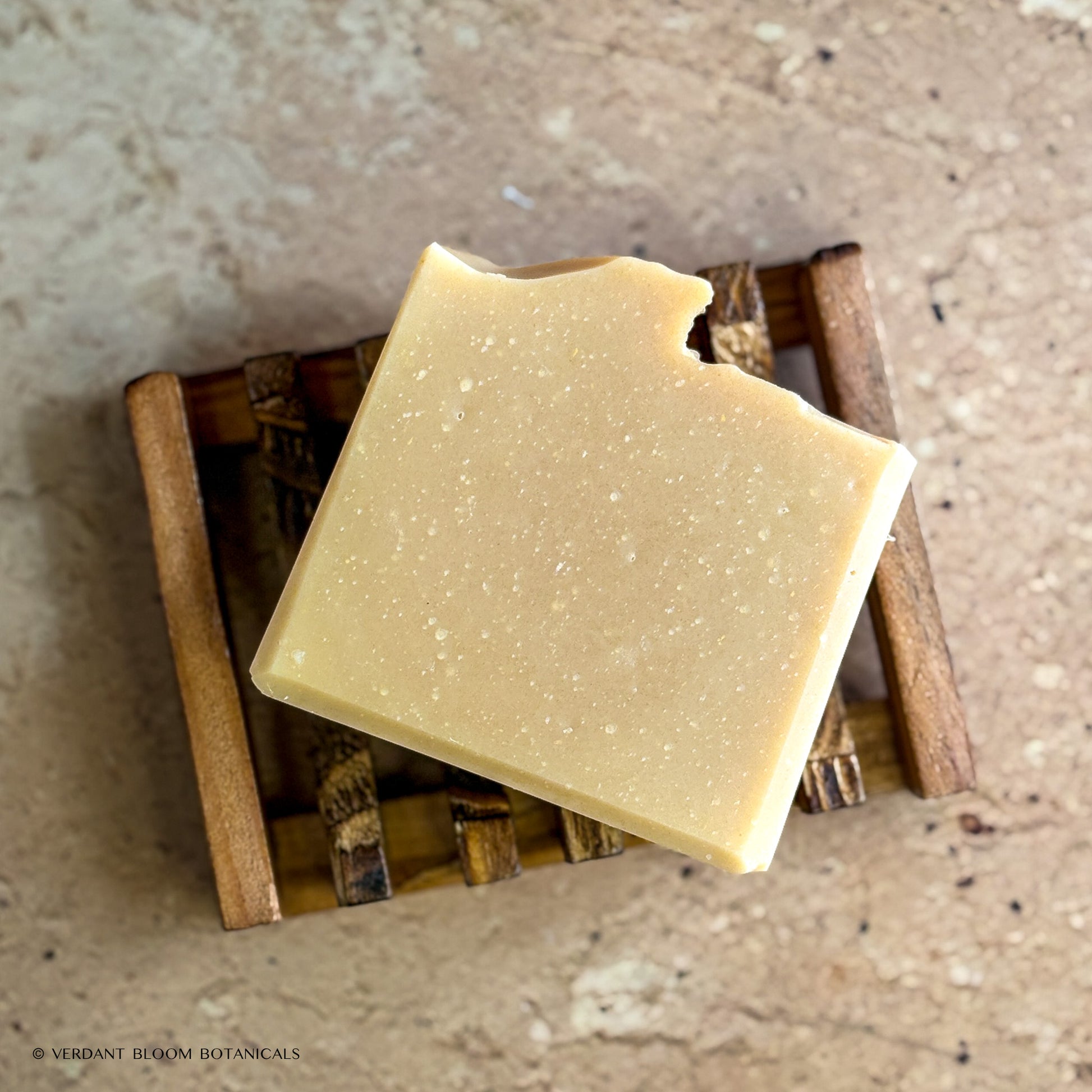 Milk & Honey soap bar on wooden soap holder