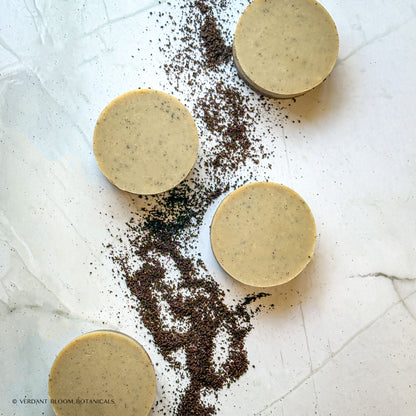 Handmade exfoliating mini soap with ground coffee