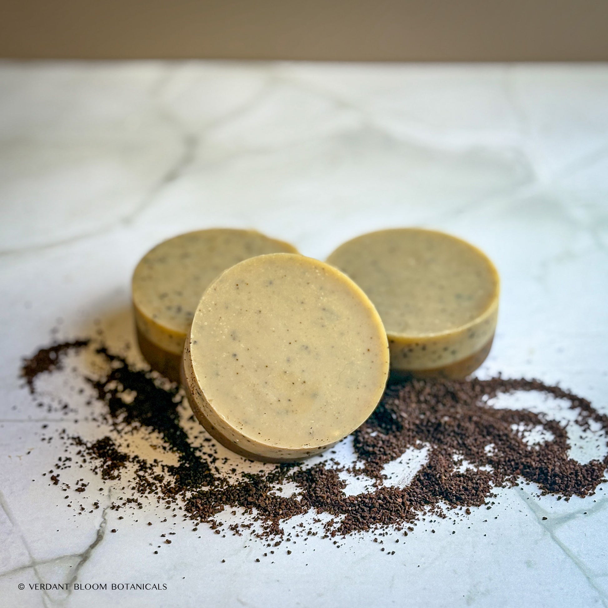 Handmade exfoliating mini soap with ground coffee