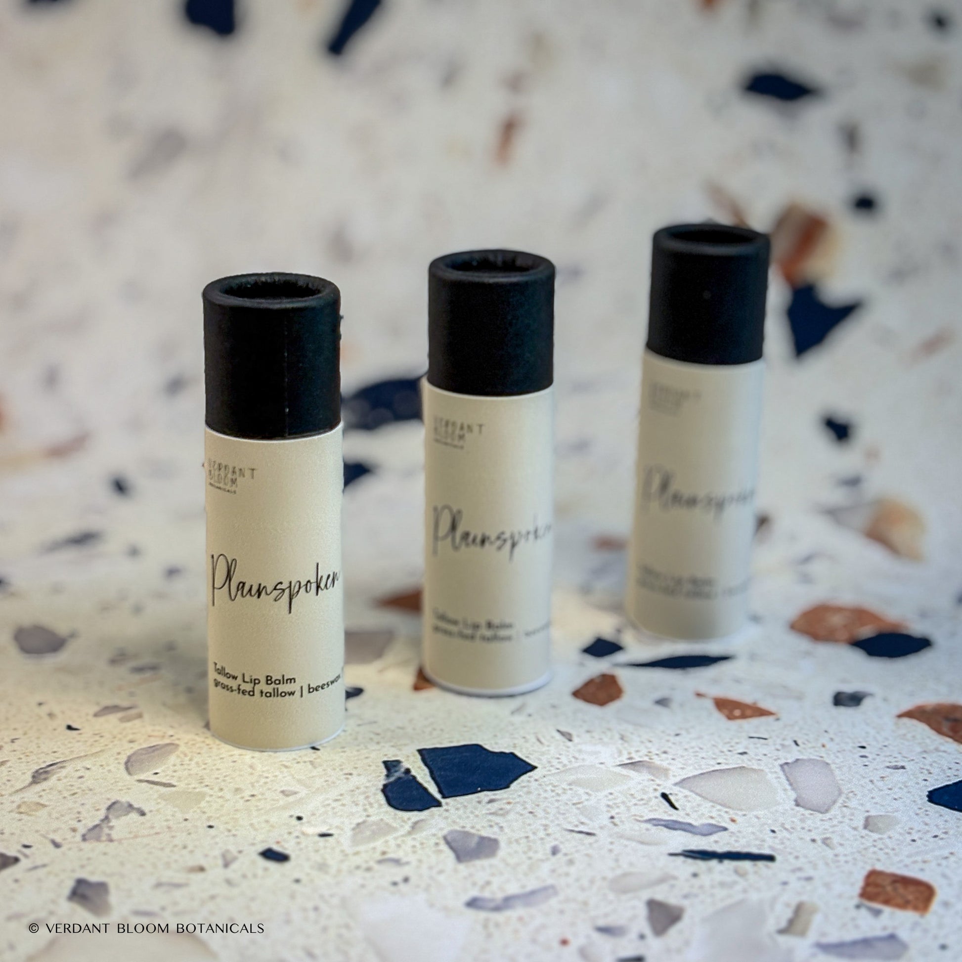 Three tubes of Plainspoken lip balm 
