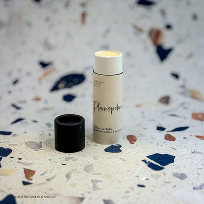 Opened Plainspoken lip balm tube