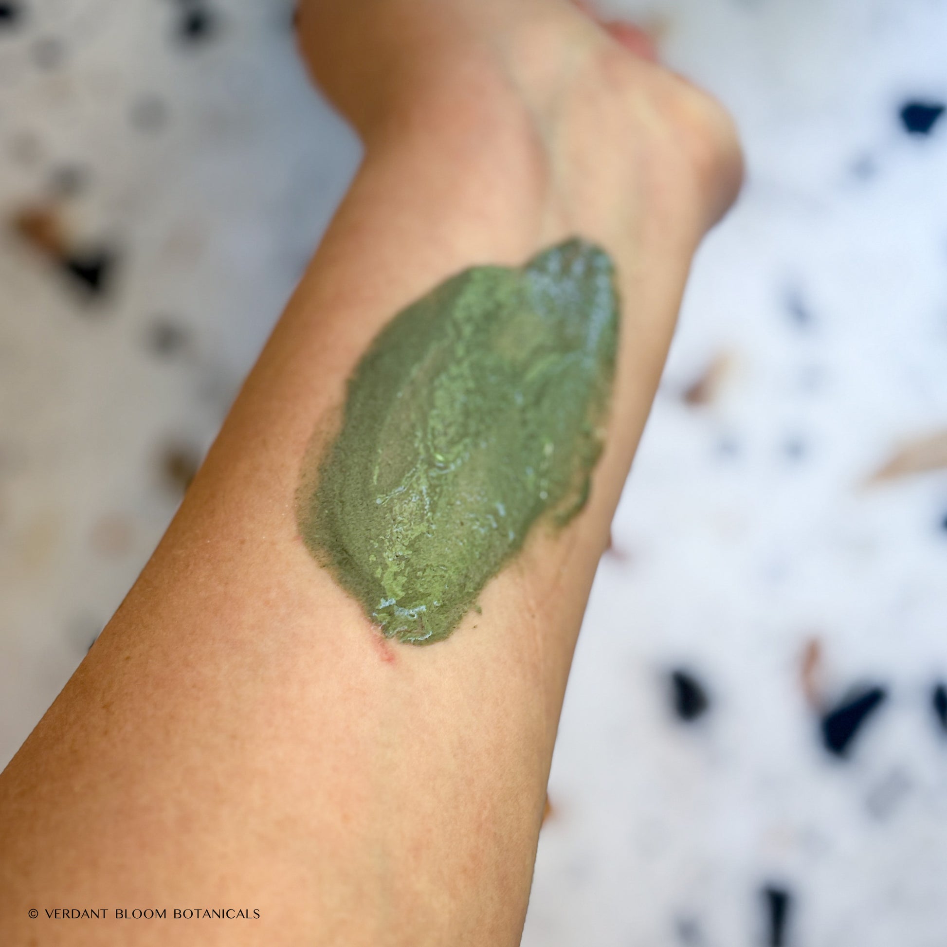 mixed Pure State face mask applied to arm
