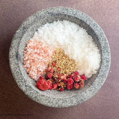 ingredients of Radiant Bloom in granite bowl