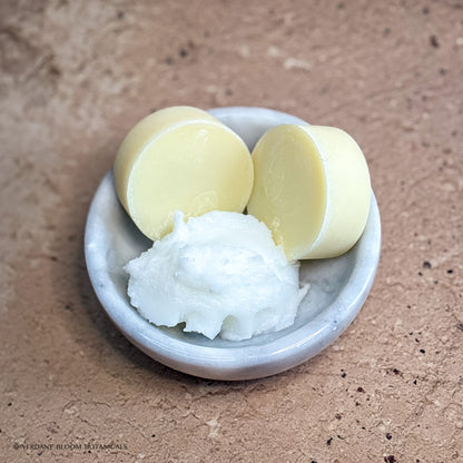 two Raw Remedy mini soaps in bowl with tallow
