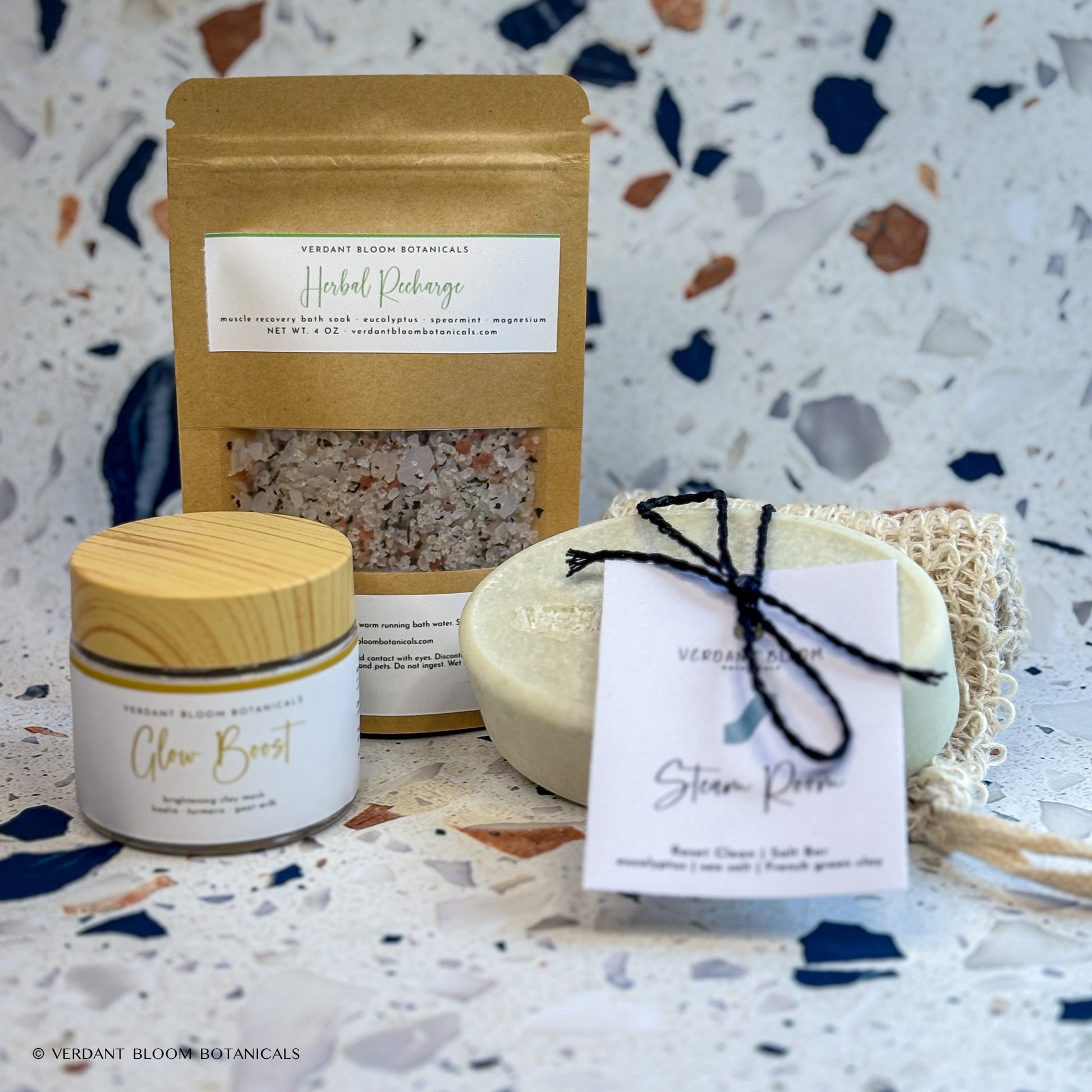 Recovery Kit containing bath soak, face mask, salt bar, and sisal soap bag