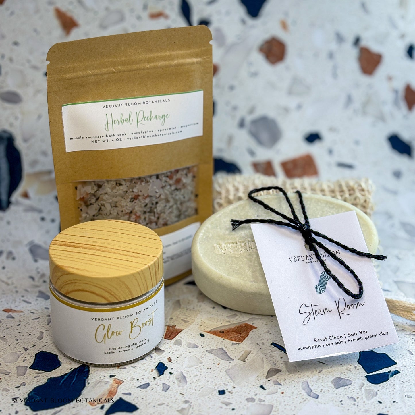 Recovery Kit containing bath soak, face mask, salt bar, and sisal soap bag