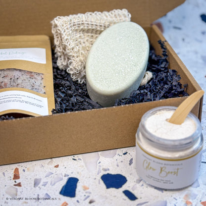 Recovery Kit containing bath soak, face mask, salt bar, and sisal soap bag in gift box