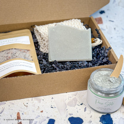 Skin Reset Kit including bath soak, face mask, goat milk soap, and sisal soap bag in gift box