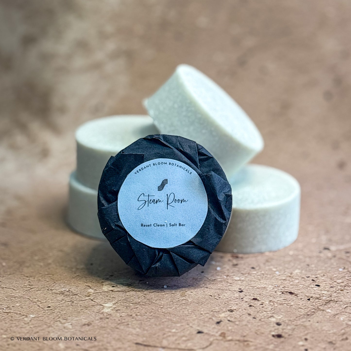 stack of Steam Room mini salt bars with label 