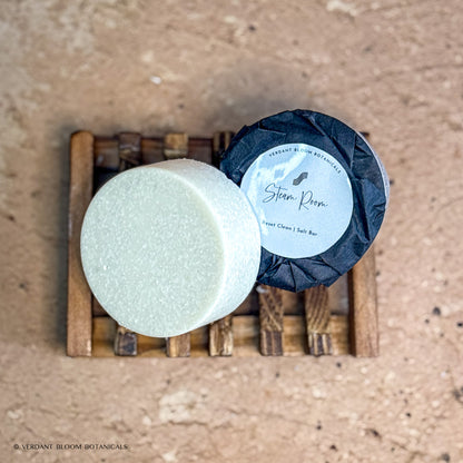 two Steam Room mini salt bars with label on wooden soap holder