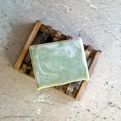 Still Pines soap bar on wooden soap holder