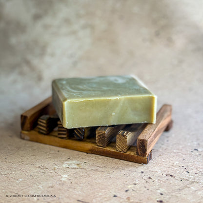 Still Pines soap bar on wooden soap holder