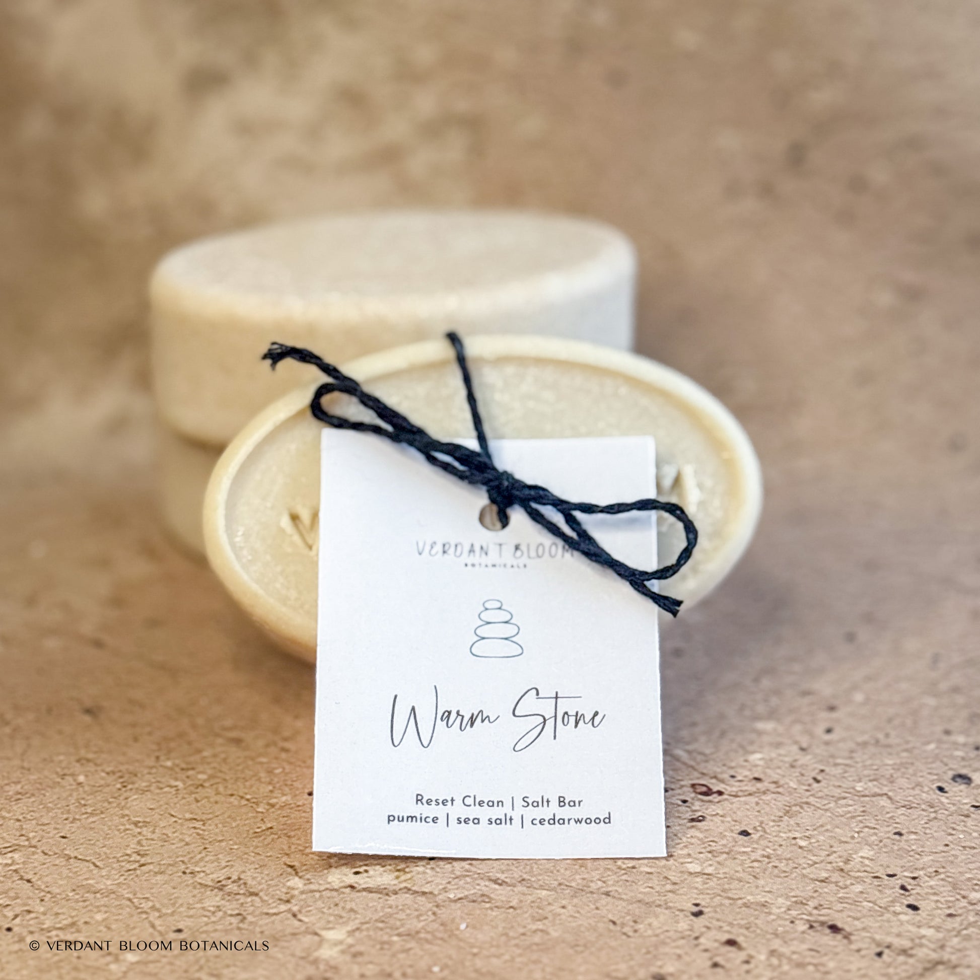 stack of Warm Stone salt bars with label