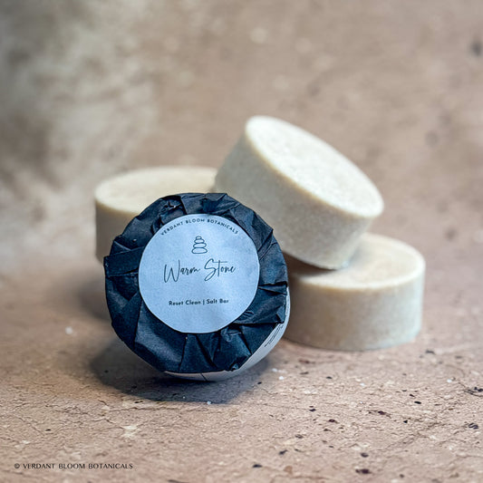 stack of Warm Stone mini salt bars with label